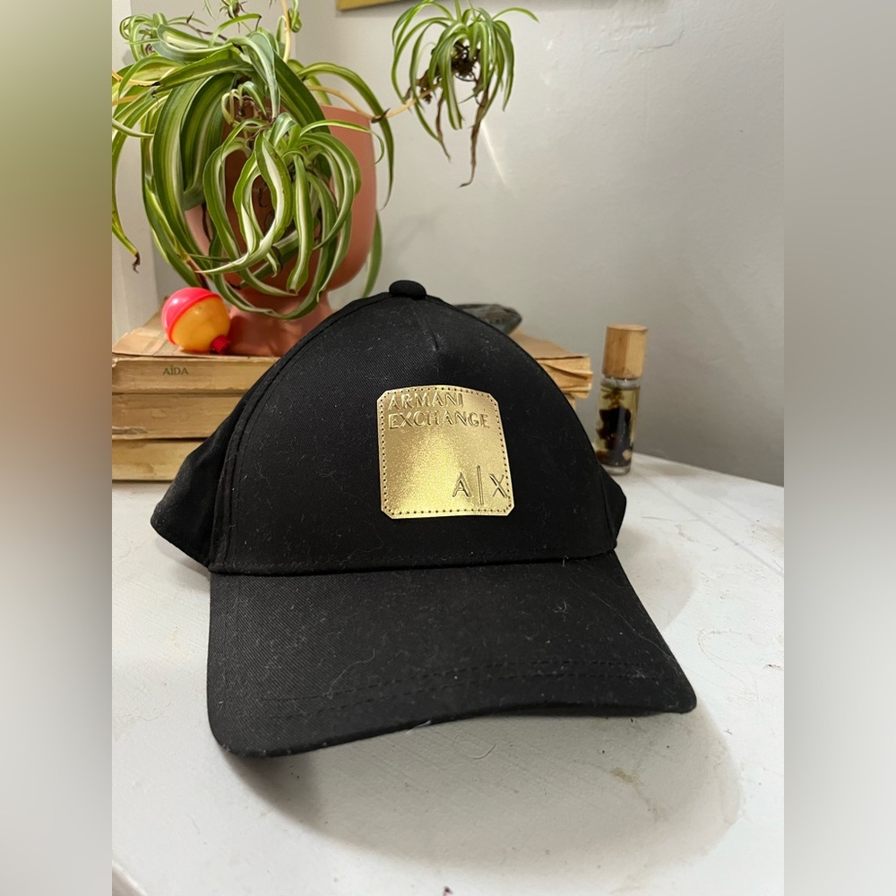 Armani Exchange Black Hat with Gold Emblem
